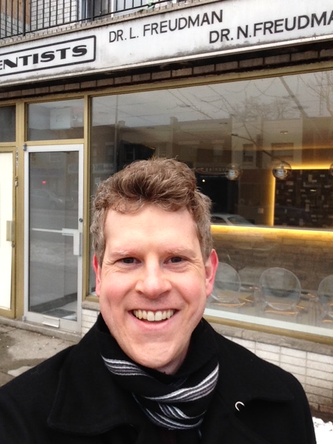 David Del Grande in front of his childhood dentist's office on the Danforth. 